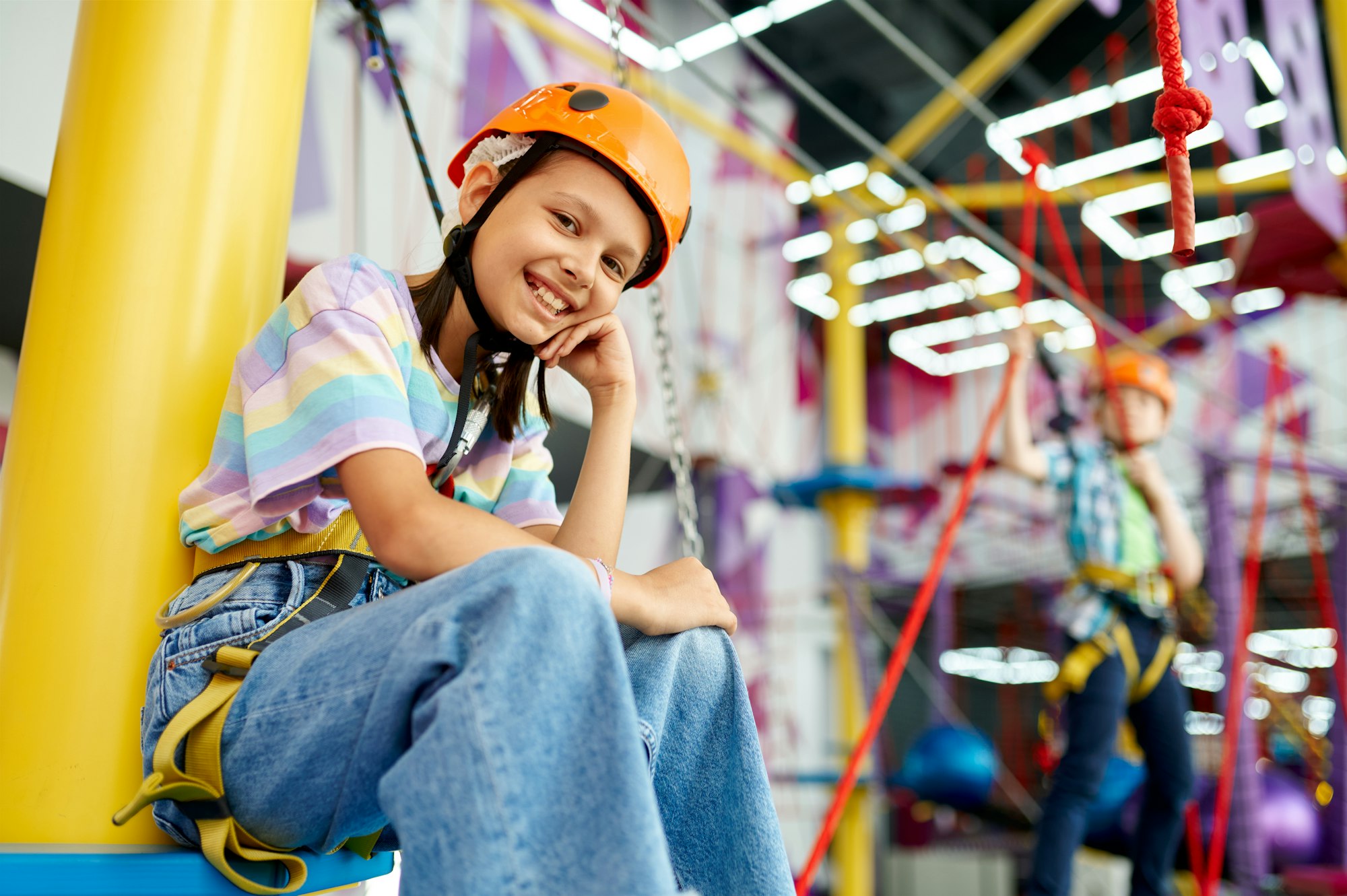 Happy girl in climbing area